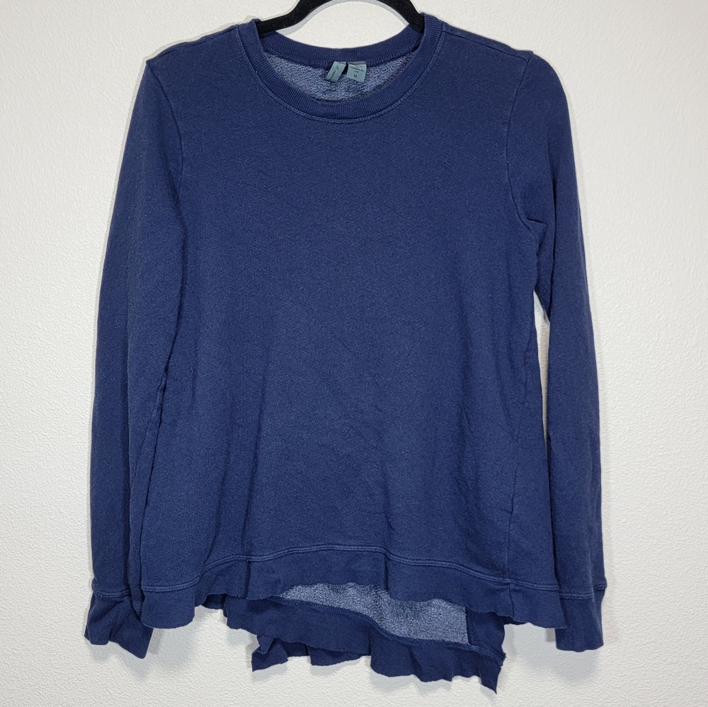 Left of center crisscross back navy crewneck sweater ruffle detail